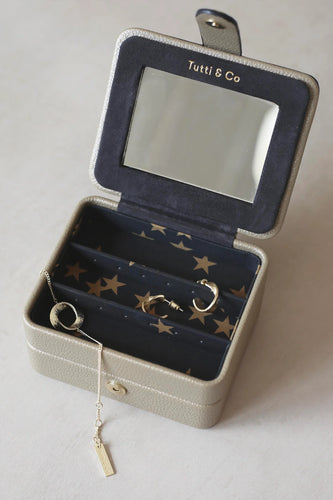 Double layer travel jewellery box with a mirror and celestial stars in gold on dark grey interior