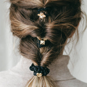 Hair bands used to create a plait