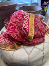 Load image into Gallery viewer, Bright pink square and circle block printed scarf with a gold border made in India