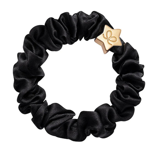 Silk hair scrunchie in black with a gold star charm - wear it in your hair or on your wrist!