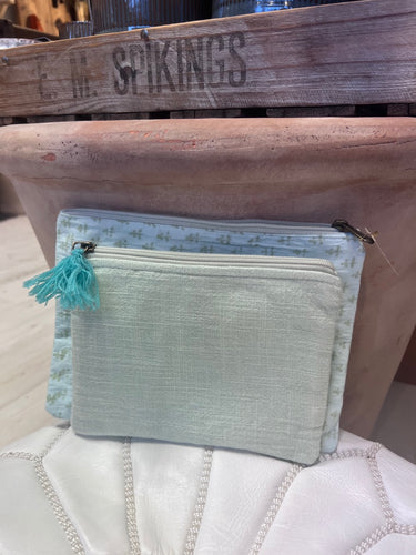 Zip up pouch in pale turquoise linen with turquoise tassel