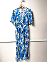 Load image into Gallery viewer, Bright blue and green floral print dress on white. Tie at the bust with short sleeves