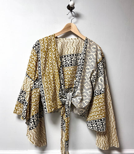Indian wrap cotton top with a block printed design in black and mustard