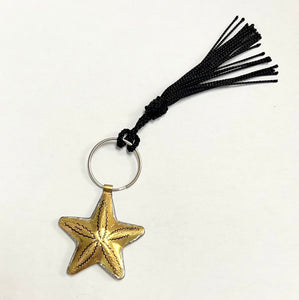 Brass star keyring with an added tassel