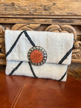 Load image into Gallery viewer, Beni Ourain rug clutch with bright orange clasp