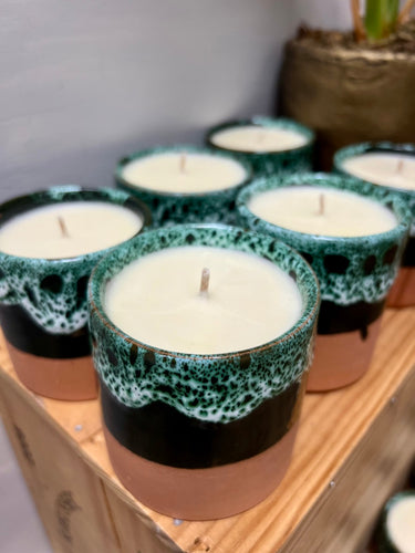 Jasmine scented candle in a green glazed pot