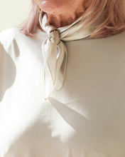 Load image into Gallery viewer, A small neck scarf in 100% silk in a soft oyster greige