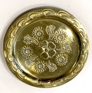 Handmade beaten brass metal coasters with traditional floral etchings 
