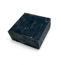 Load image into Gallery viewer, Black small square bar of soap with texture and fragranced with black pomegranate