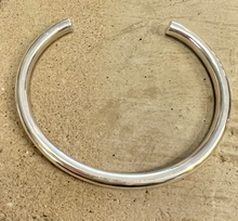 Load image into Gallery viewer, A simple shiny sterling silver adjustable cuff bracelet .