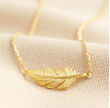 Load image into Gallery viewer, A gold delicate detailed feather on a plain chain. Made from 18ct gold plated metal