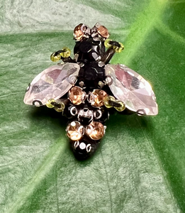 A little bee brooch made from a selection of sparkly gems