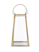 Load image into Gallery viewer, This elegant lantern is made from brass. It features glass sides, and to the top there is a brass handle which can be lifted up or down. The lantern has a flat base so candles can be stood inside, and to the underneath there is a black felt base so it can stand on a table or mantelpiece