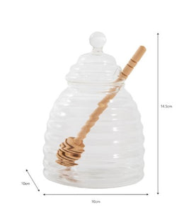 a ridged glass honey pot with a lid. a beech dibber comes with to complete the set, and to drizzle your honey with ease.