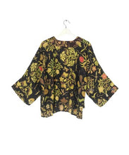 Load image into Gallery viewer, A bestselling kimono from One Hundred Stars in a print, with a black background, and an all over print. Loose 3/4 sleeves and an open front with a lightly embroidered lapel.