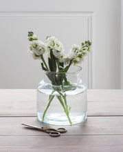 Load image into Gallery viewer, Short and wide glass vase with a rim. Perfect for tulips and other slightly shorter stemmed flowers