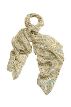 Load image into Gallery viewer, Featuring an intricate carpet of blossom petals and flowers scattered across this summery aqua blue background. A lightweight soft scarf measuring a generous 100 x 200cm.