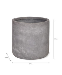 A weatherproof and frost proof planter in grey. A minimalist block design.