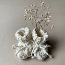 Load image into Gallery viewer, These handmade baby booties by Gooseberry Fool are made from a soft 100% organic cotton in India. In a timeless design and with matching cotton tie, they are the ideal new baby gift. Available in size 0-3 months and in 3 colourways. They are the perfect new baby gift. 