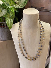 Load image into Gallery viewer, A short ladies necklace with beads in grey and gold in various shapes and shades. A double layered style fastened by a clasp at the back which is adjustable. 