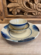 Load image into Gallery viewer, handmade in Vietnam, therefore no two bowls will be the same. With a beige coloured background, they are handpainted using a beautiful shade of blue. 15cm diameter.
