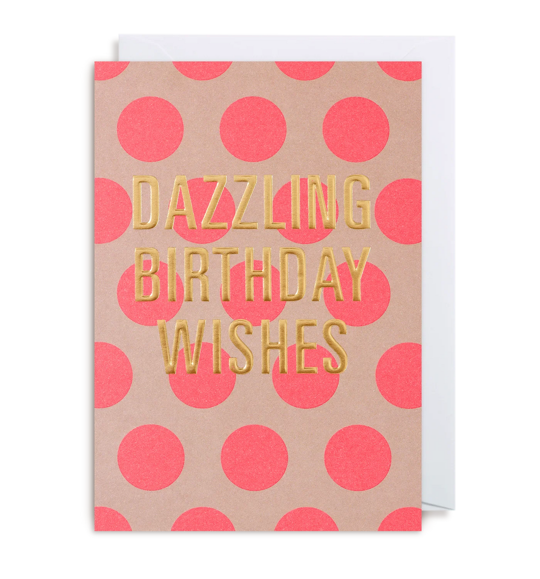 A bright card in mauve with shocking pink dots and gold wording.
