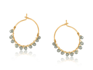 Delicate 2 cm hoops with tiny irregular shaped crystals woven onto them with gold wire.