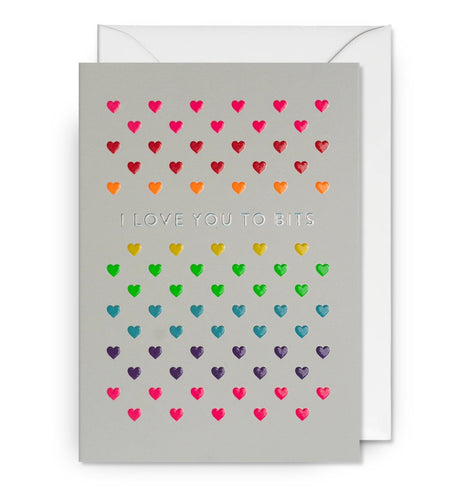 Love you to bits card covered in tiny hearts in pink, red, orange, yellow, green, blue and purple.