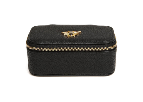 Compact jewellery storage box in black with a gold bee detail on it, a zip around the top and a mirror inside