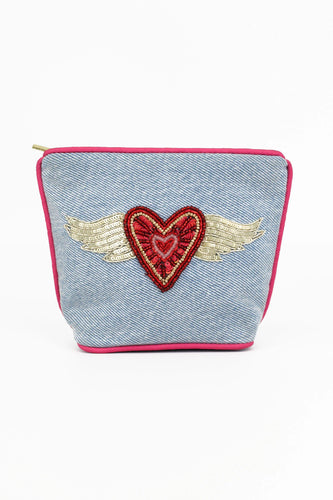 A red heart with gold wings embroidered onto a washed denim purse. Sequins and beads create this mini masterpiece