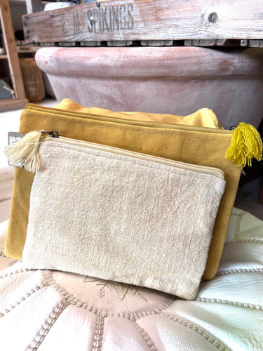 Pale yellow linen pouch with tassel zip 