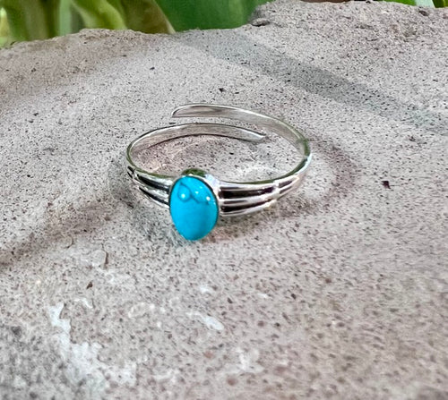 Adjustable oval turquoise ring in sterling silver