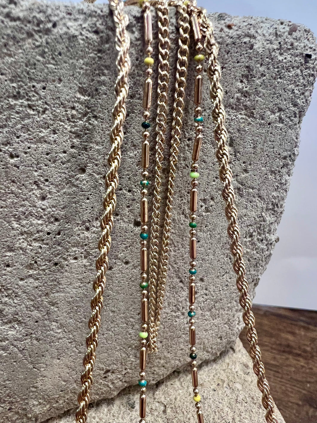 gold triple layered long necklace with coloured beads 