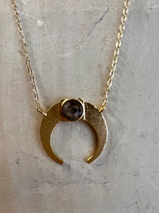 gold plated Crescent moon necklace with a labradorite stone at its centre