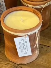 Load image into Gallery viewer, Moroccan rustic terracotta candles with lids. Each is filled with a citrus blend of essential oils and soy wax.