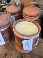 Load image into Gallery viewer, Moroccan rustic terracotta candles with lids. Each is filled with a citrus blend of essential oils and soy wax.