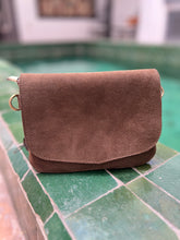 Load image into Gallery viewer, Golden brown suede mini handbag with a long adjustable strap and a wrist strap.