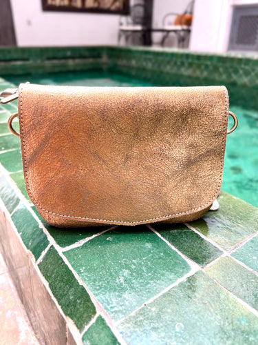 Rose Gold Crossbody bag with a choice of adjustable leather strap or wrist strap