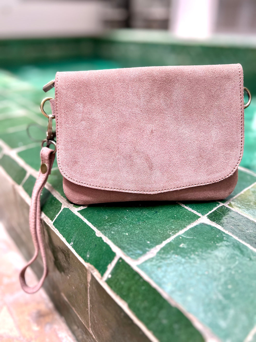 Dusky Pink Suede Crossbody bag. Made by hand by artisans in Marrakech