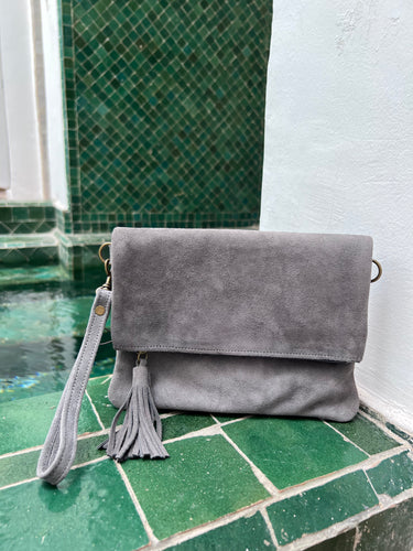 Grey suede classic fold over handbag with tassel - comes with a long  adjustable strap and a wrist strap - BE Lifestyle Boutique