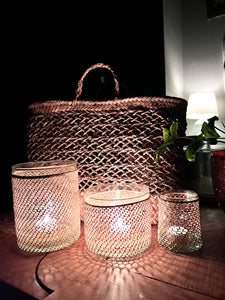 Lanterns shown in the dark with the light shining through