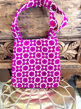 Load image into Gallery viewer, Tote bag in fuchsia with side poppers done up to make the bag more compact