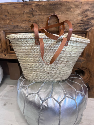 Large palm grass basket with both long and short handles in tan leather