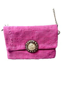 Bright pink cactus silk handbag with statement buckle