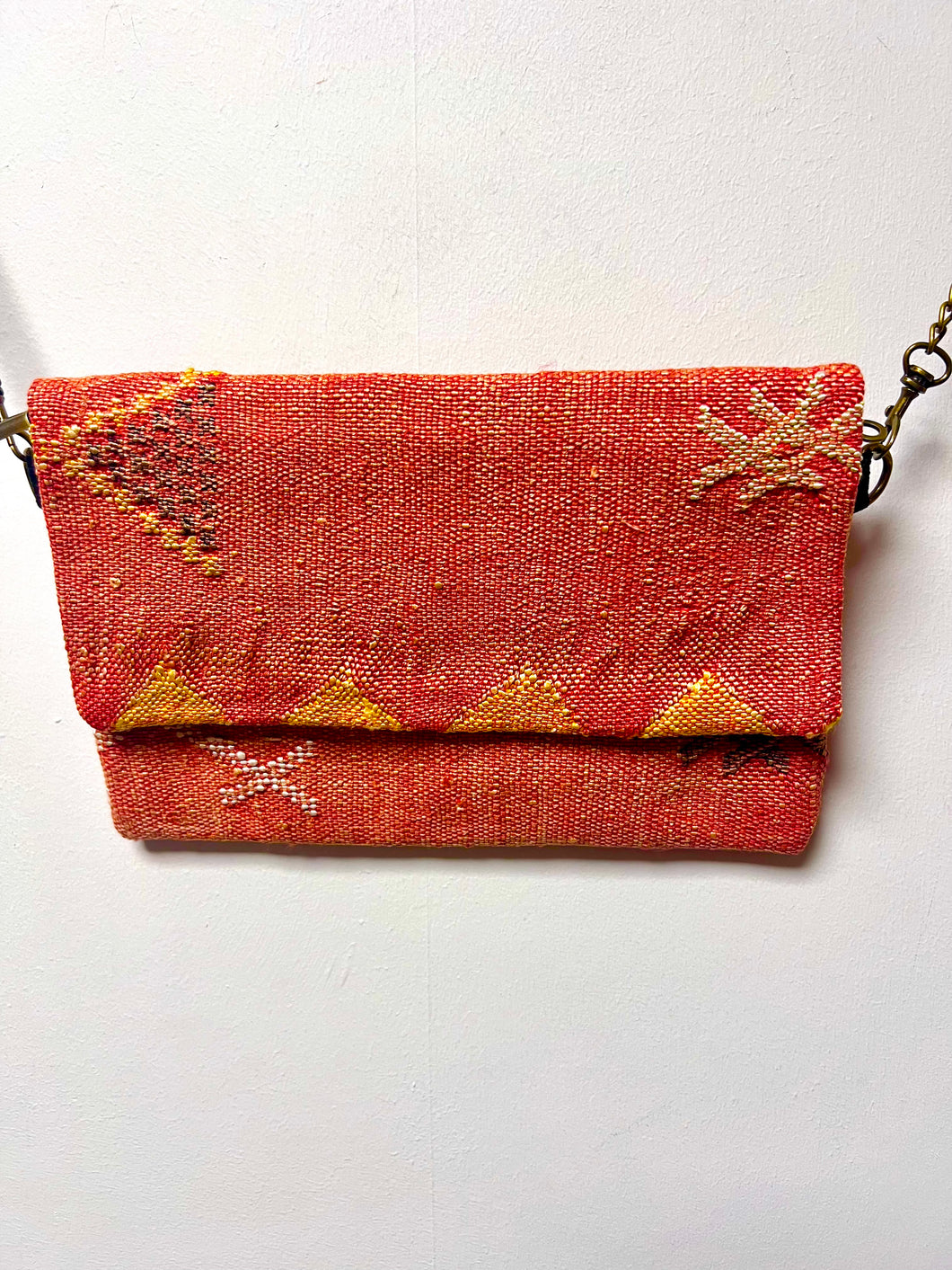 Orange cactus silk clutch bag with crossbody chain