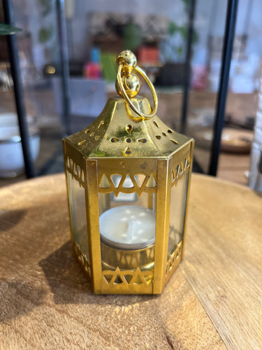 Mini brass lantern for a t light.