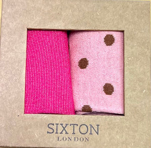 A sock box duo in pink presented in a Kraft box