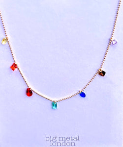 Brightly coloured stones on a fine chain necklace