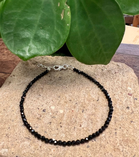 Fine black obsidian crystals on a sterling silver wire with a small extender chain and hook