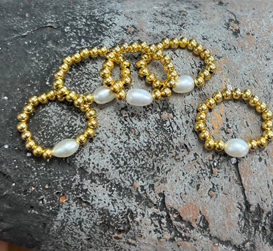 gold plated beaded ring with a feature white pearl